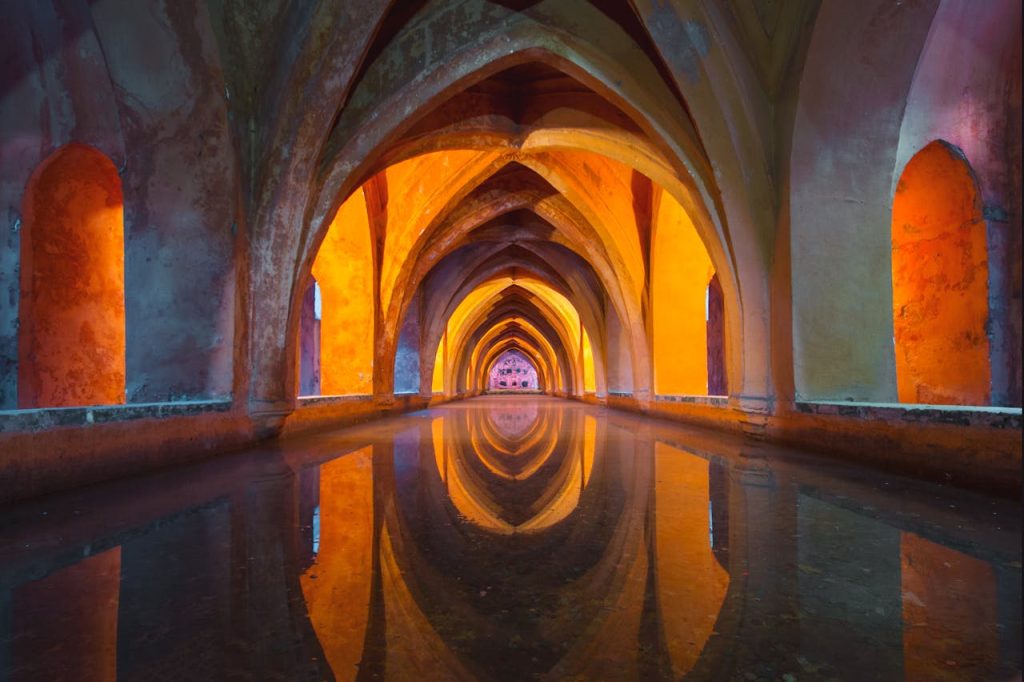 Mastering the First Impression: Your intriguing post title goes here Beautiful Gothic arches reflecting in water, vibrant colors create a mesmerizing effect.